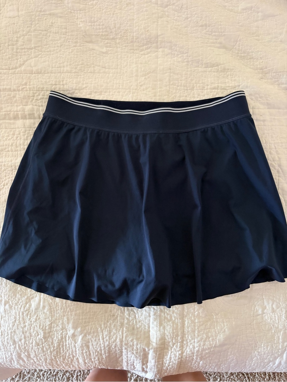 Practically new Athleta navy skort